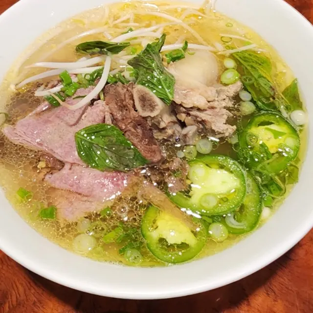 Phở with jalapeño, basil and lime